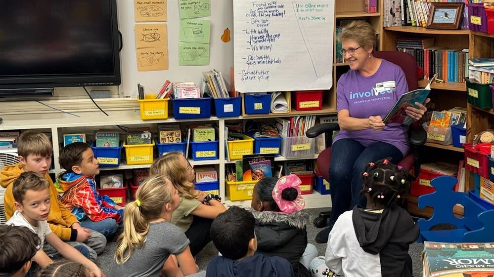 Jumpstart's annual Read for the Record reading to a third grade class.